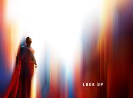 Superman flying up with the words "look up" to his right